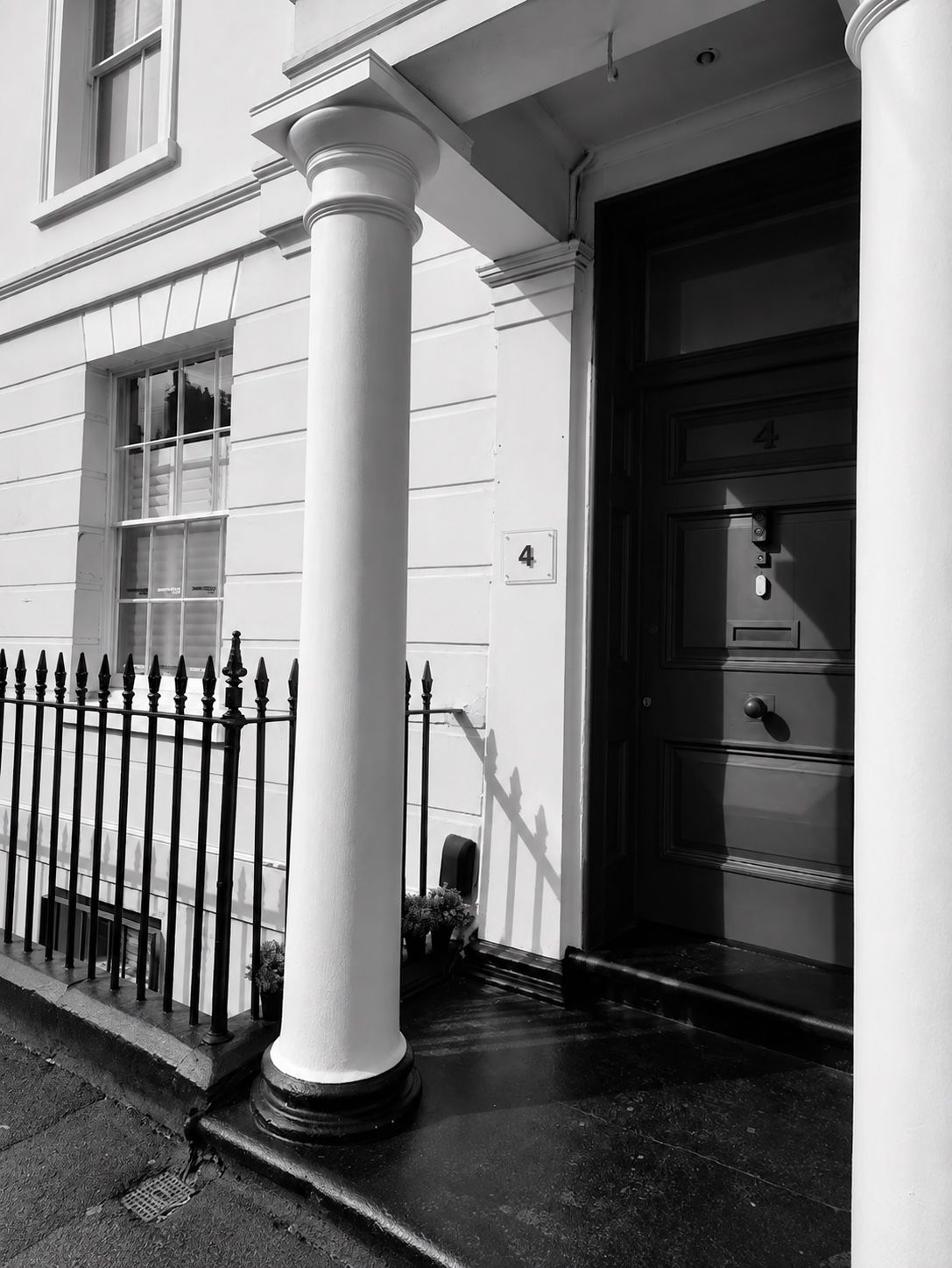 The front door of The Little London Clinic, number 4 George Street, Royal Leamington Spa
